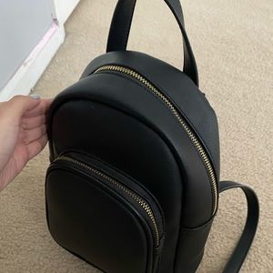 Mini black backpack